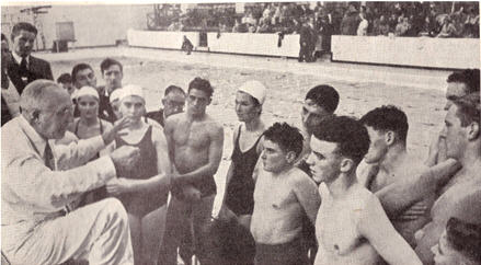 Matt Mann USA Olympic Coach having a talk with British Olympic Swimmers at King Alfred 1951